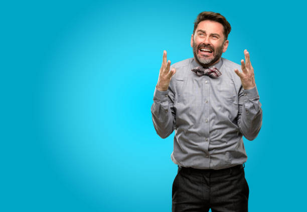 istock Middle age man, with beard and bow tie terrified and nervous expressing anxiety and panic gesture, overwhelmed 1043152684