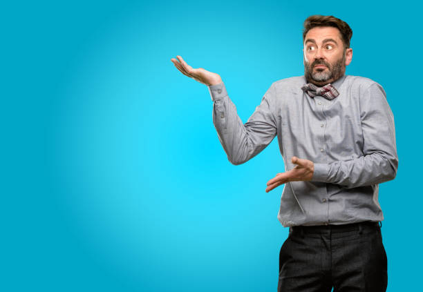 istock Middle age man, with beard and bow tie doubt expression, confuse and wonder concept, uncertain future 1043152942