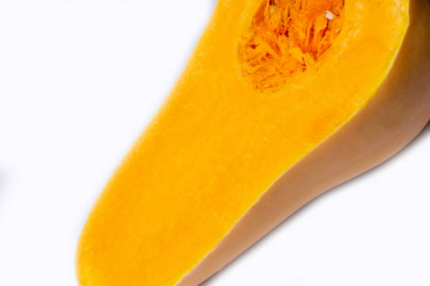 istock cut half Pumpkin isolated on a white background 1043153782