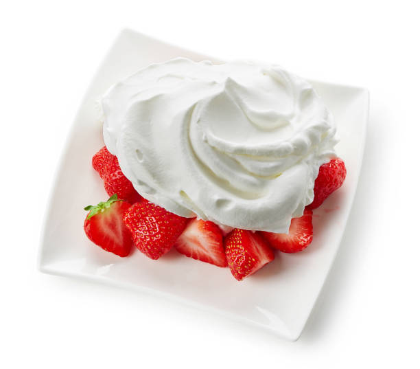 istock whipped cream desert with berries 1043157144