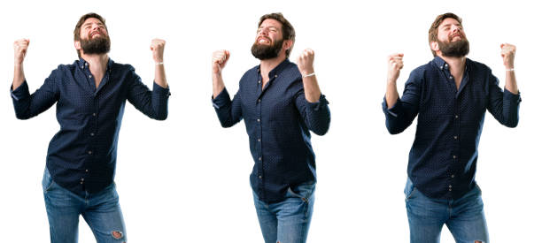 istock happy and excited expressing winning gesture. Successful and celebrating victory, triumphant 1043160772
