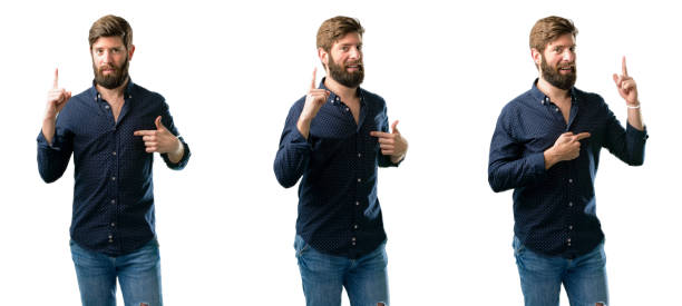 istock happy and surprised cheering expressing wow gesture pointing up 1043161050