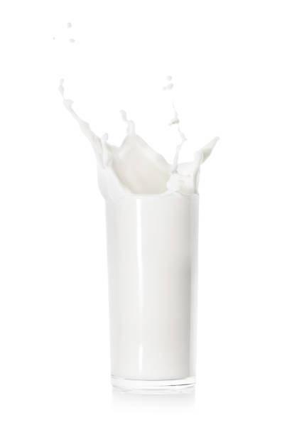 istock Splash of fresh milk in a glass cup 1043161210