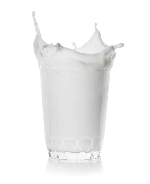 istock Splash in a low glass of milk 1043161214