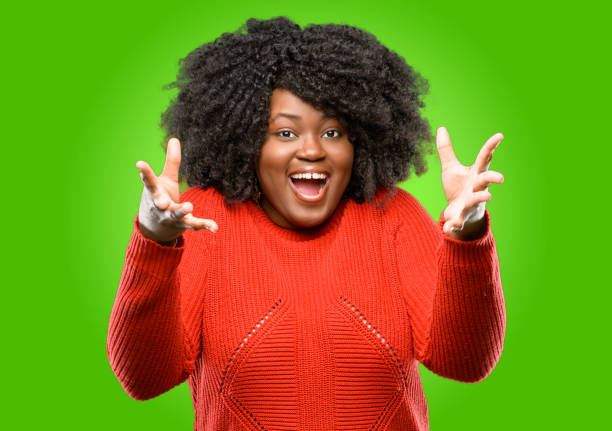 istock happy and surprised cheering expressing wow gesture 1043164900