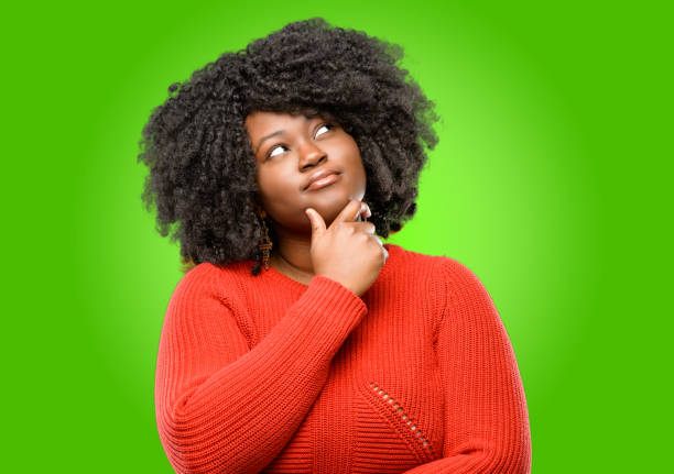 istock thinking and looking up expressing doubt and wonder 1043164926