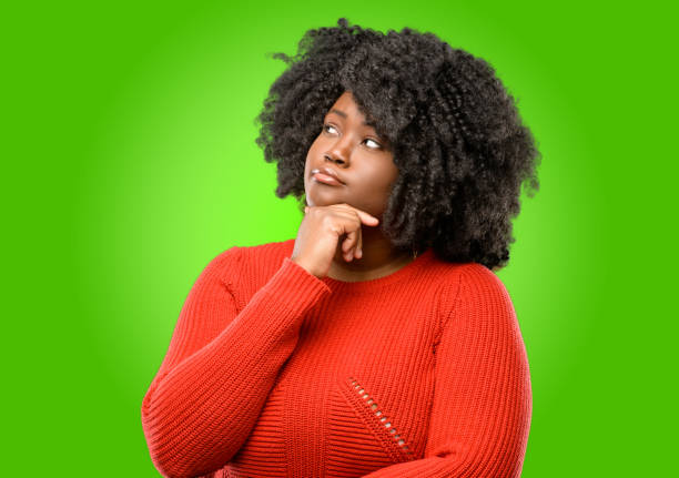 istock thinking and looking up expressing doubt and wonder 1043164954