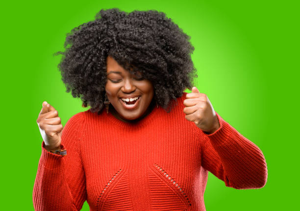 istock happy and surprised cheering expressing wow gesture 1043165094
