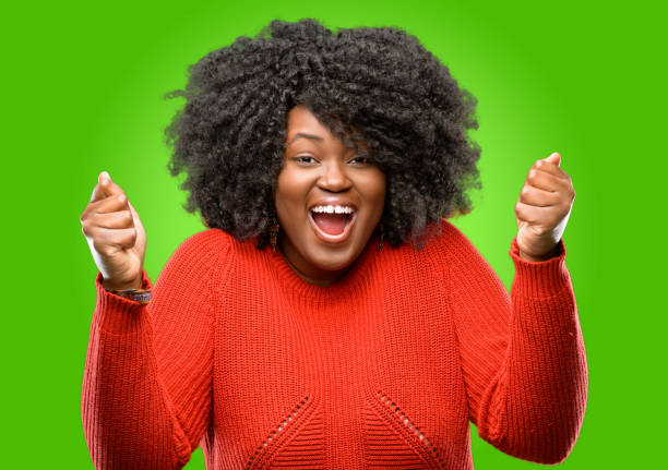 istock happy and surprised cheering expressing wow gesture 1043165114