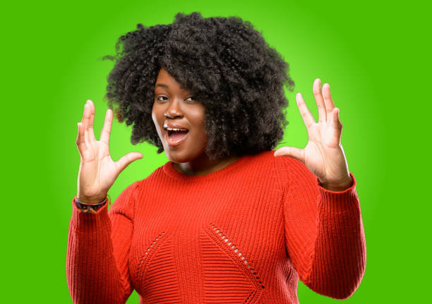 istock happy and surprised cheering expressing wow gesture 1043165274