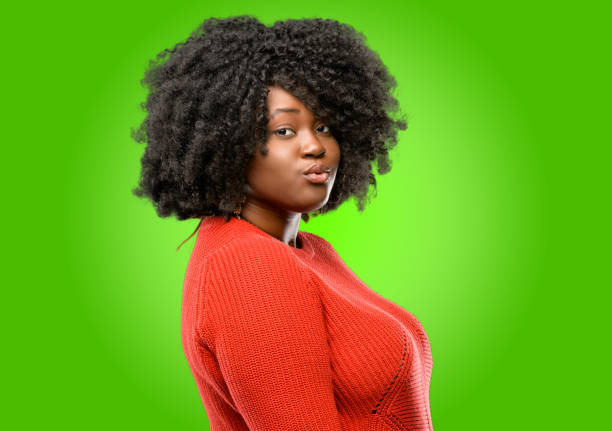 istock expressing love, blows kiss at camera, flirting 1043165338
