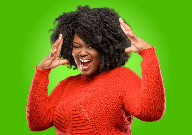 istock happy and surprised cheering expressing wow gesture 1043165592