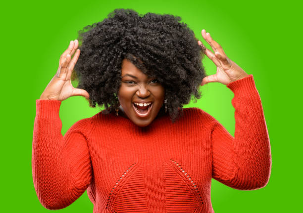istock happy and surprised cheering expressing wow gesture 1043165594