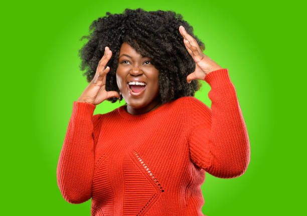 istock happy and surprised cheering expressing wow gesture 1043165618