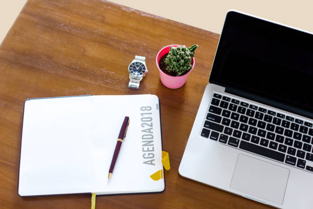istock Office desk table with stationary, laptop, camera, and typewriter 1043172354