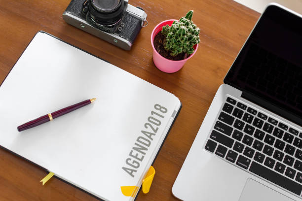 istock Office desk table with stationary, laptop, camera, and typewriter 1043174448