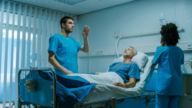 istock Futuristic Medical Ward with Sick Patient Lying in Bed and Doctor using Gestures for Augmented Reality. Great Template for Future Technology. 1043174882