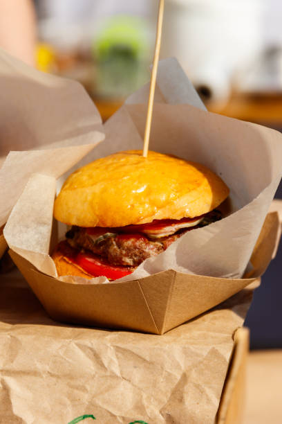 istock Delicious big hamburger packed in cardboard box 1043175052