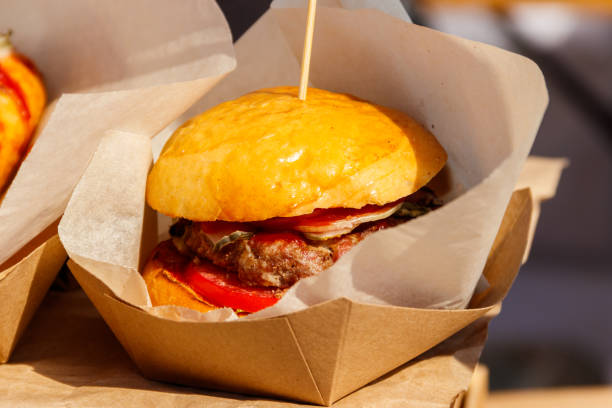 istock Delicious big hamburger packed in cardboard box 1043175054