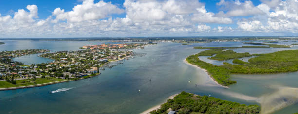 Panorama of Fort Pierce Florida from the Air Fort Pierce has an inlet to the Atlantic Ocean that allows boats to come and go from the ocean. sound port stock pictures, royalty-free photos & images