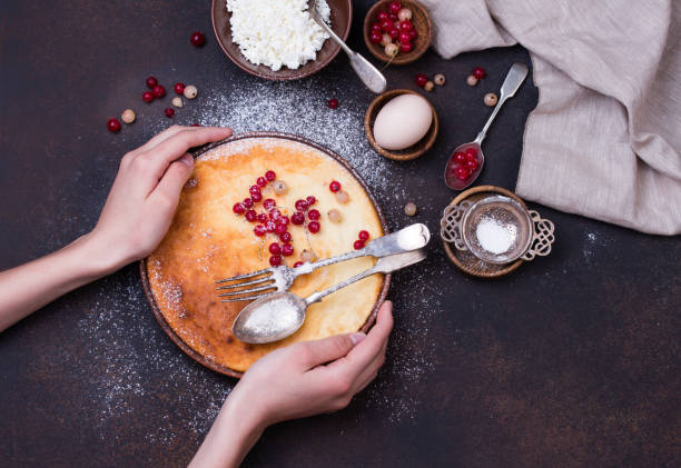istock Homemade cheesecake with fresh red currant berries 1043179658