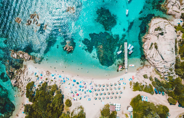 istock Aerial view of people at beach 1043184652