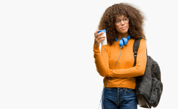 African american student woman thinking and looking up expressing doubt and wonder