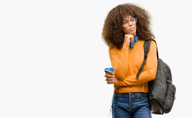 istock African american student woman thinking and looking up expressing doubt and wonder 1043190744