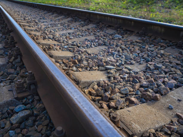 istock Railway crossing, railway going into the distance. 1043191412