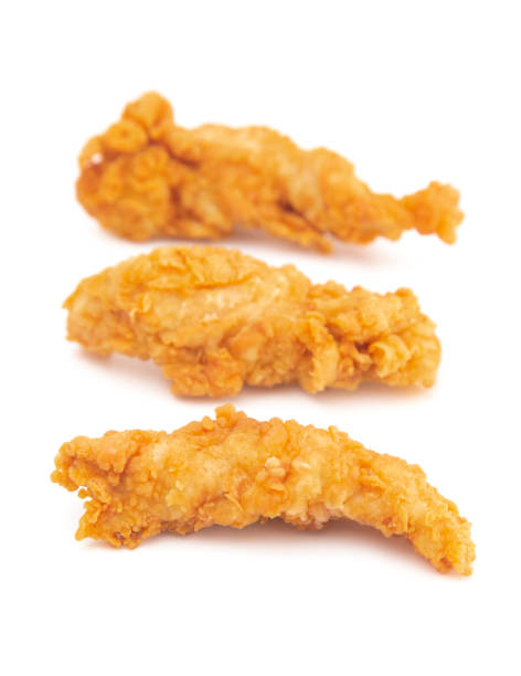 Golden Fried Chicken Fingers on a White Background Golden Fried Chicken Fingers on a White Background chicken finger stock pictures, royalty-free photos & images