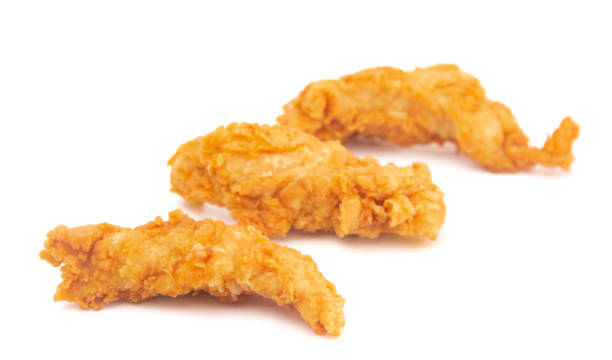 istock Golden Fried Chicken Fingers on a White Background 1043194876