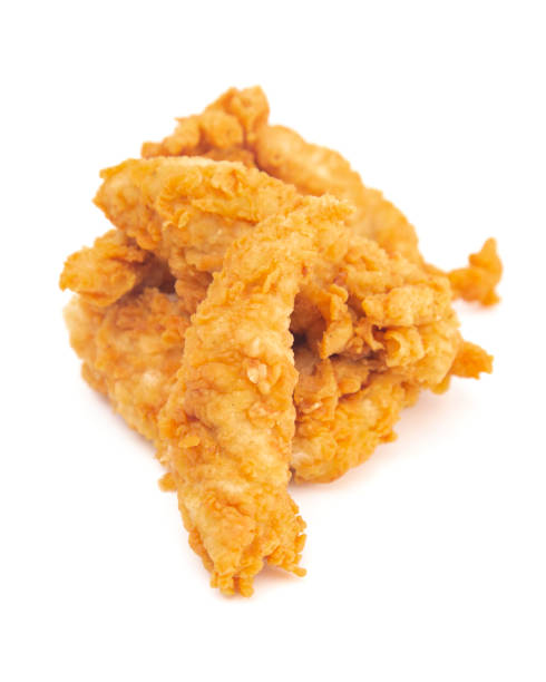 istock Golden Fried Chicken Fingers on a White Background 1043195034