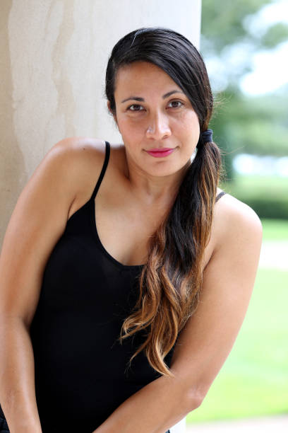 istock Head and shoulders of a young woman 1043200372
