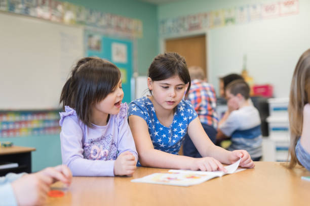 Student Reciting In Class 220+ Reciting In Class Stock Photos, Pictures & Royalty-Free Images ...