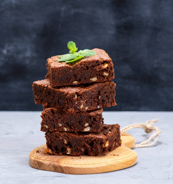 istock stack of baked square pieces of brownie pie 1043214340