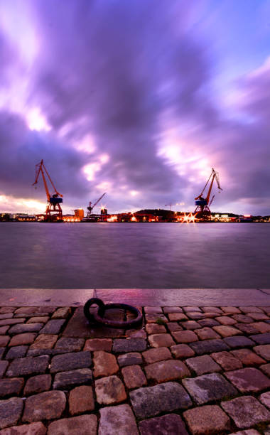 Sunset in Gothenburg with cranes