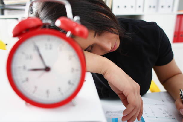 istock Tired and exhausted woman have a lot of work with documents fall asleep 1043218904