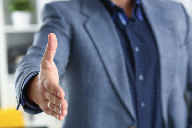 istock businessman work in office lend hand ahead closeup 1043219230