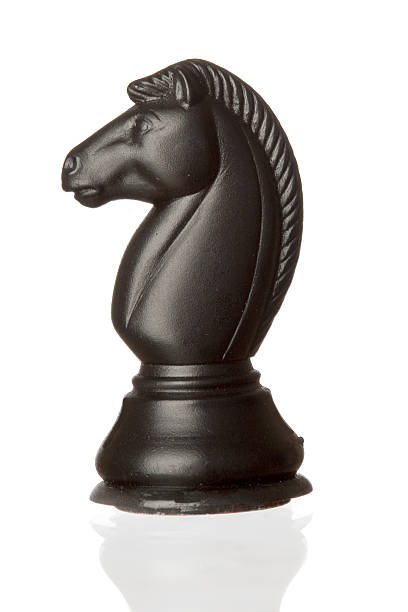 istock Black horse chess piece on a white background 104322427