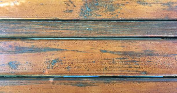 istock Dark wood table texture background surface with old natural pattern or old wood texture table top view. Grunge surface with wood texture background. Vintage timber texture background. Rustic table top view 1043248704