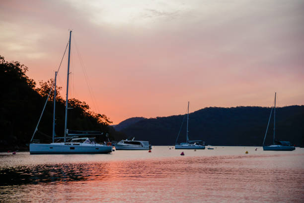 istock Dusk on the water with yachts 1043248976