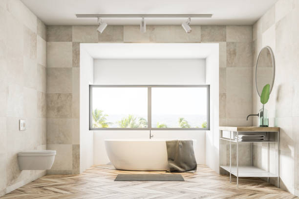 istock White bathroom interior, tub and sink 1043255524