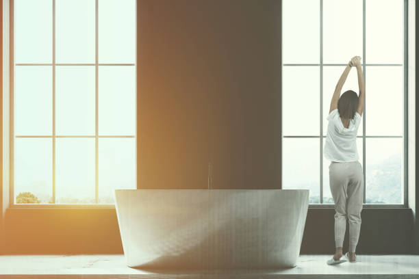 istock Dark loft bathroom interior, woman 1043258042