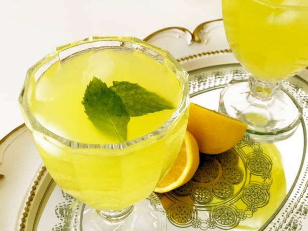 lemonades and lemons on tray stock photo