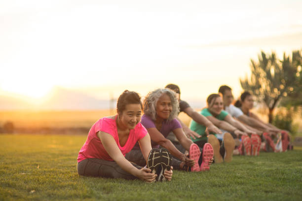 istock Coed yoga outside in the morning! 1043266328