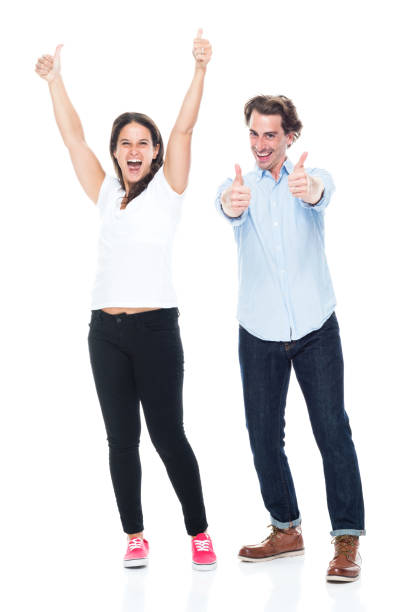 istock Attractive couple showing thumbs up 1043288110