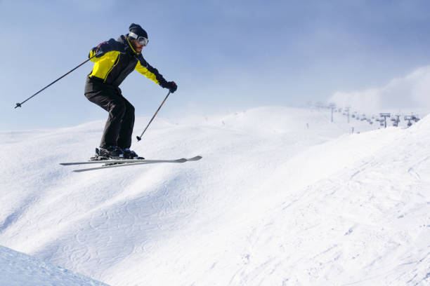 istock Jumping skier at mountains 1043299574