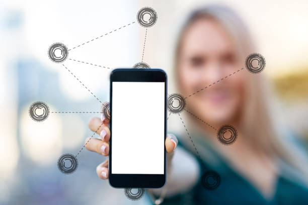 istock Woman showing a blank smartphone screen 1043302270