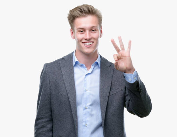 istock Young handsome blond business man showing and pointing up with fingers number three while smiling confident and happy. 1043302564