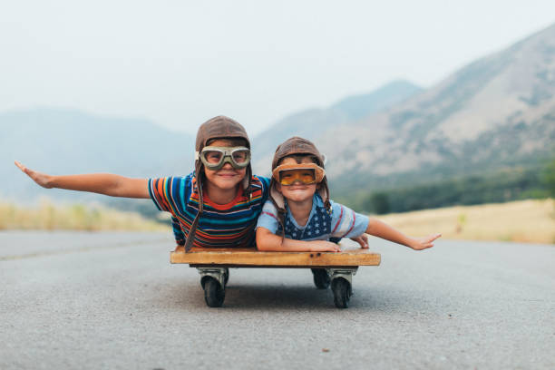 istock Young Boys Flying on a Press Cart 1043320466